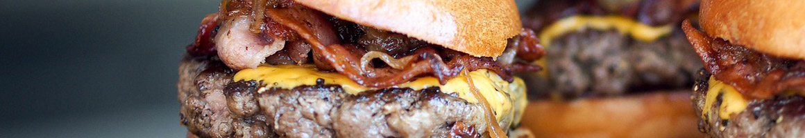 Eating Burger at Burgermaster restaurant in Bothell, WA.